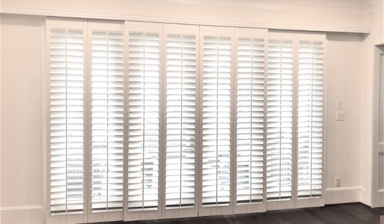 Plantation shutters are the best option for reducing energy loss from sliding patio doors in New York. Sliding patio doors in New York.